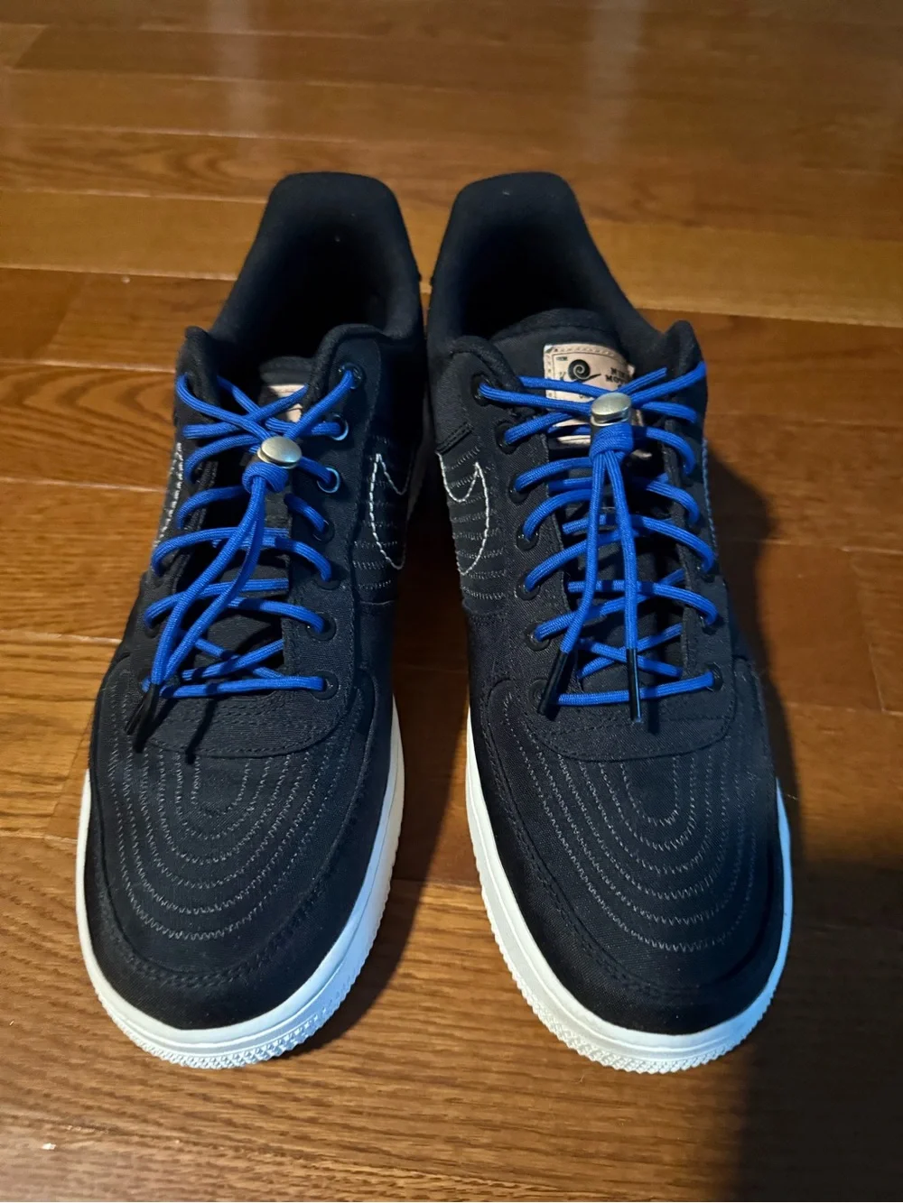 Nike Men’s Black Sneakers with Blue Laces